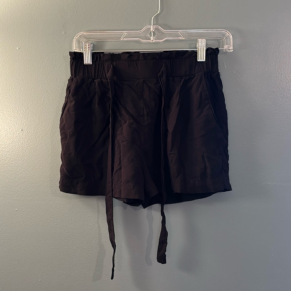 Women’s black, soft shorts with strings in front